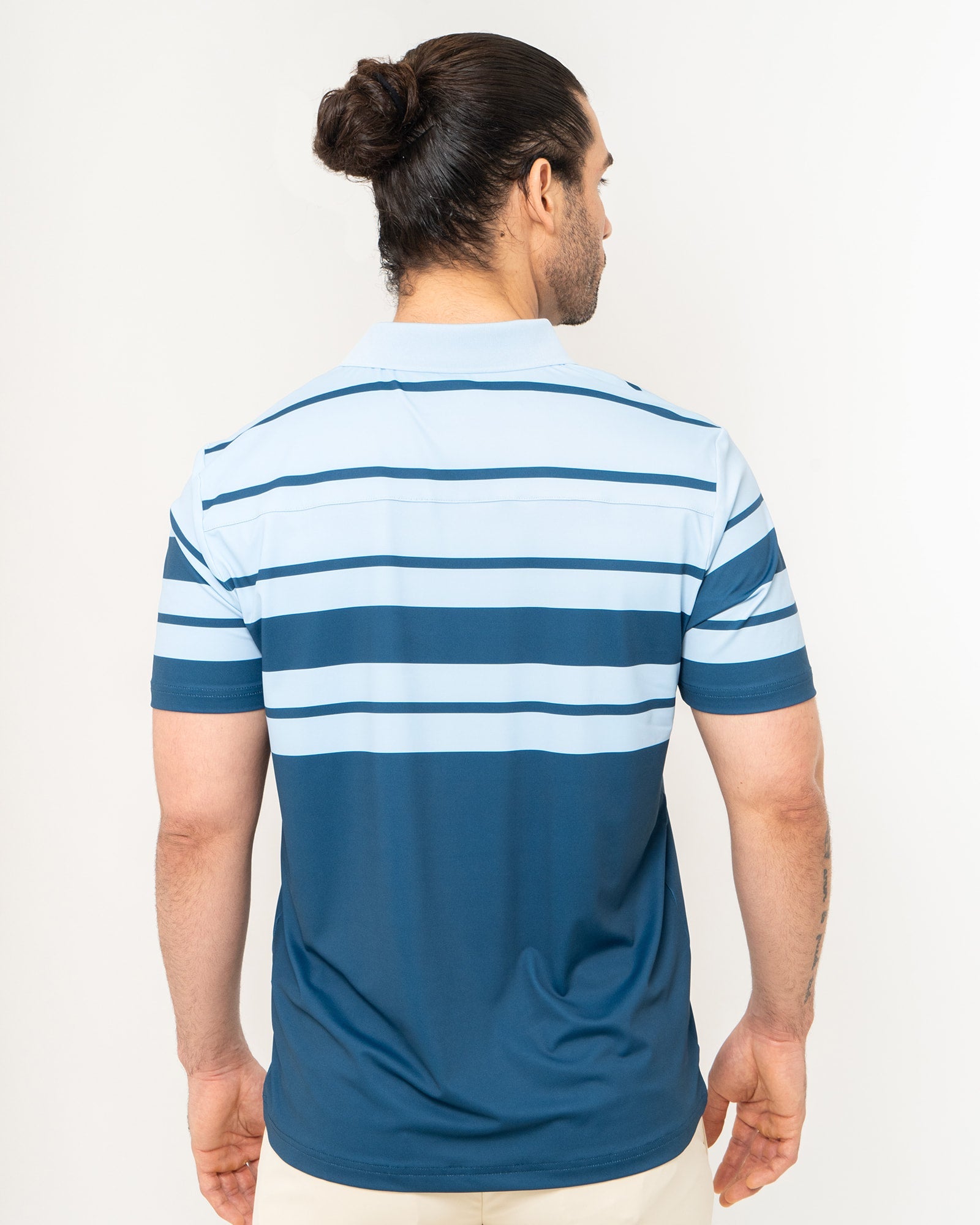 Pure Line Polo, Rayada azul, back view, Regular fit, Polyester, with 4-way stretch fabric, versatile use